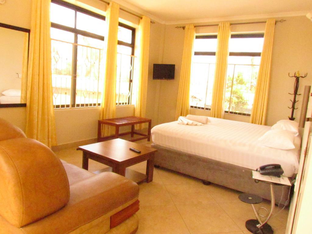 FQ Hotel Limited Daressalam Zimmer foto